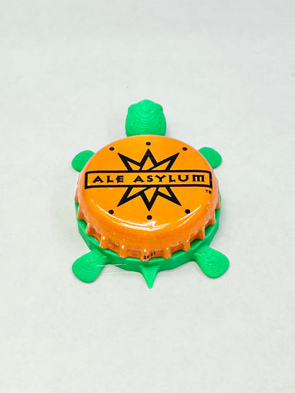 Ale Asylum - Bottle Cap Magnet Turtle Shell Shocked Art