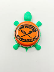 Pipeworks Brewing - Bottle Cap Magnet Turtle Shell Shocked Art