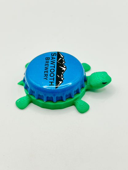 Sawtooth Brewery - Bottle Cap Magnet Turtle Shell Shocked Art