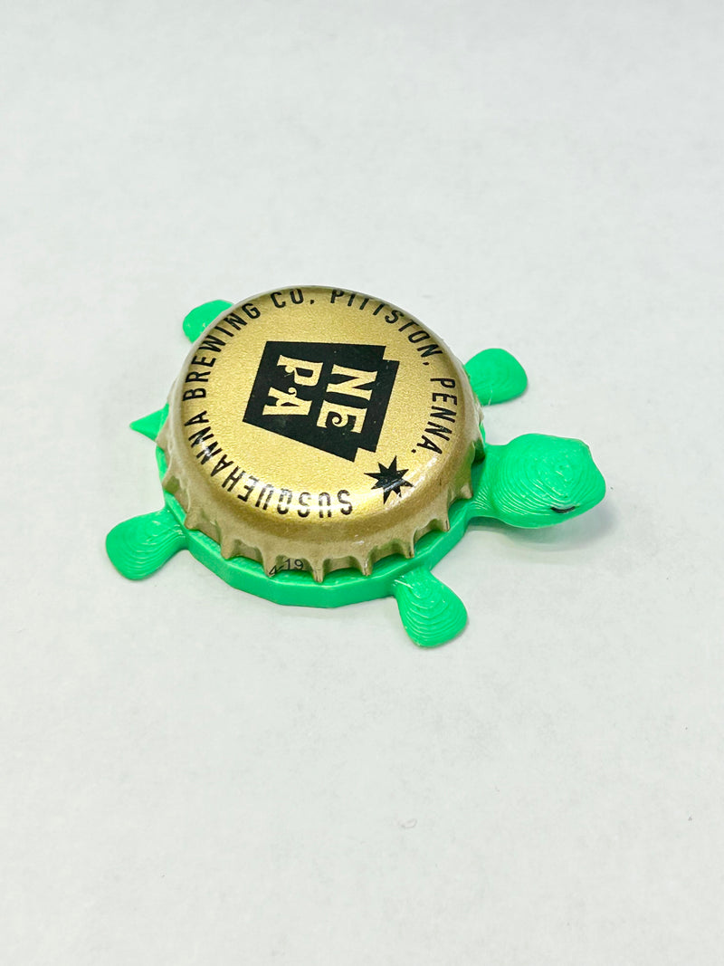 Susquehanna Brewing - Bottle Cap Magnet Turtle Shell Shocked Art