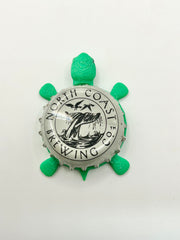 North Coast Brewing Co (Whale Tail Light Gray) - Bottle Cap Magnet Turtle Shell Shocked Art