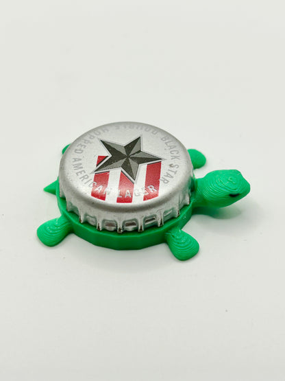 Black Star Lager - Bottle Cap Magnet Turtle Shell Shocked Art