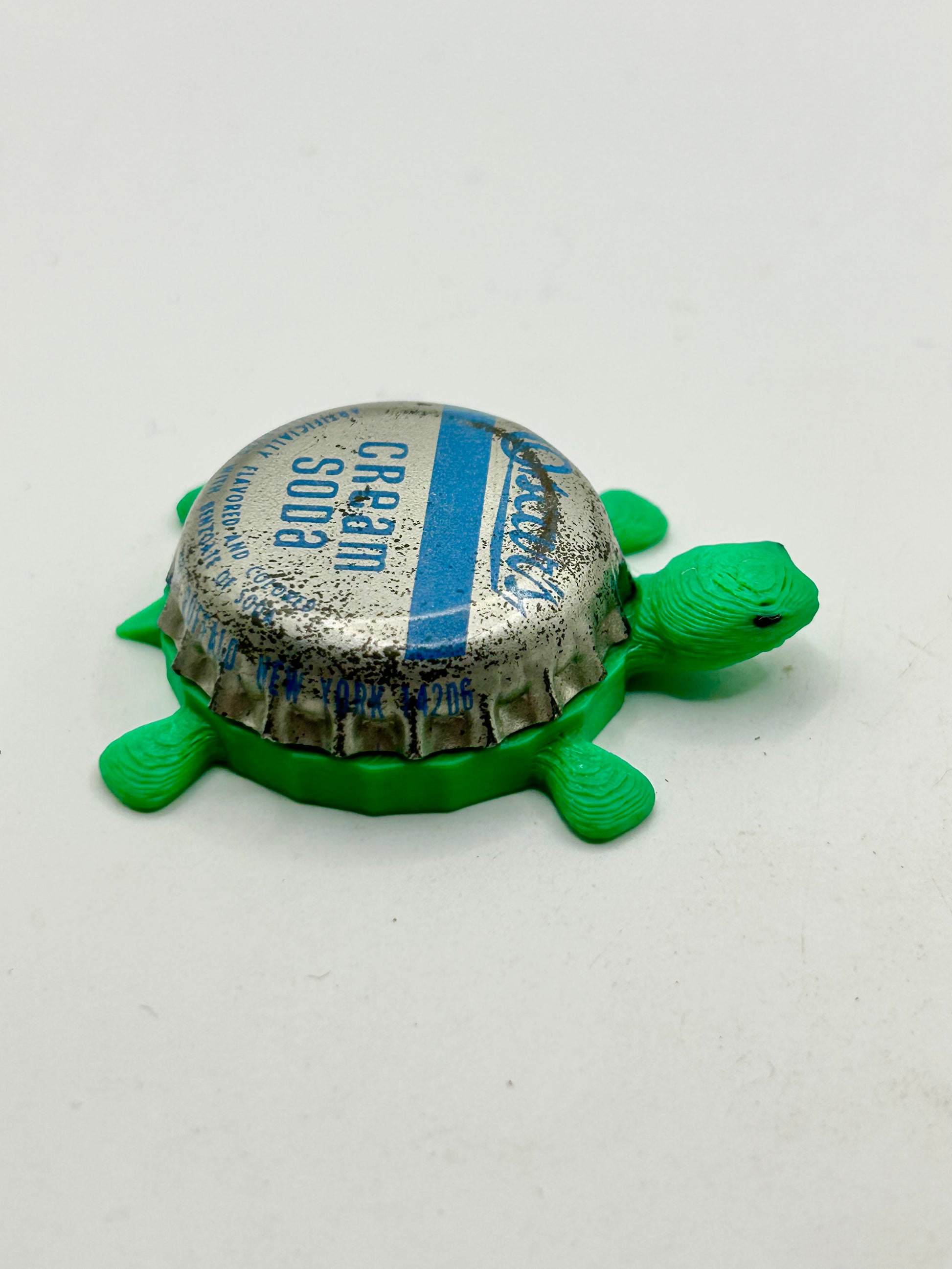 Oscar’s Cream Soda - Bottle Cap Magnet Turtle Shell Shocked Art