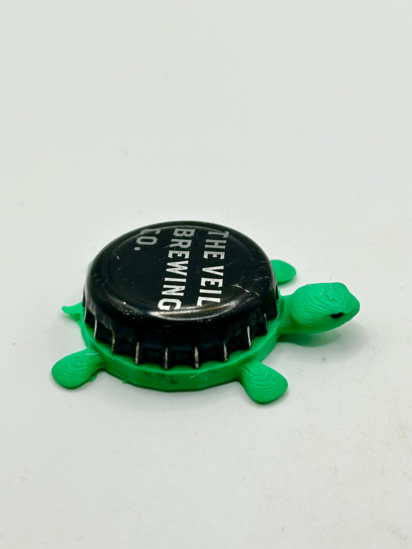 The Veil Brewing - Bottle Cap Magnet Turtle Shell Shocked Art