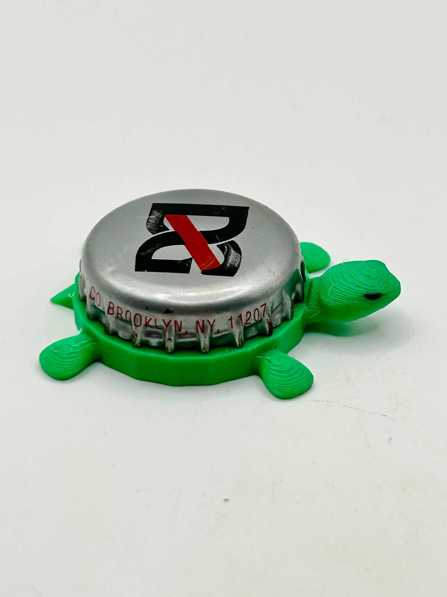 DG Jamaican Kola - Bottle Cap Magnet Turtle