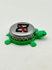 DG Jamaican Kola - Bottle Cap Magnet Turtle Shell Shocked Art