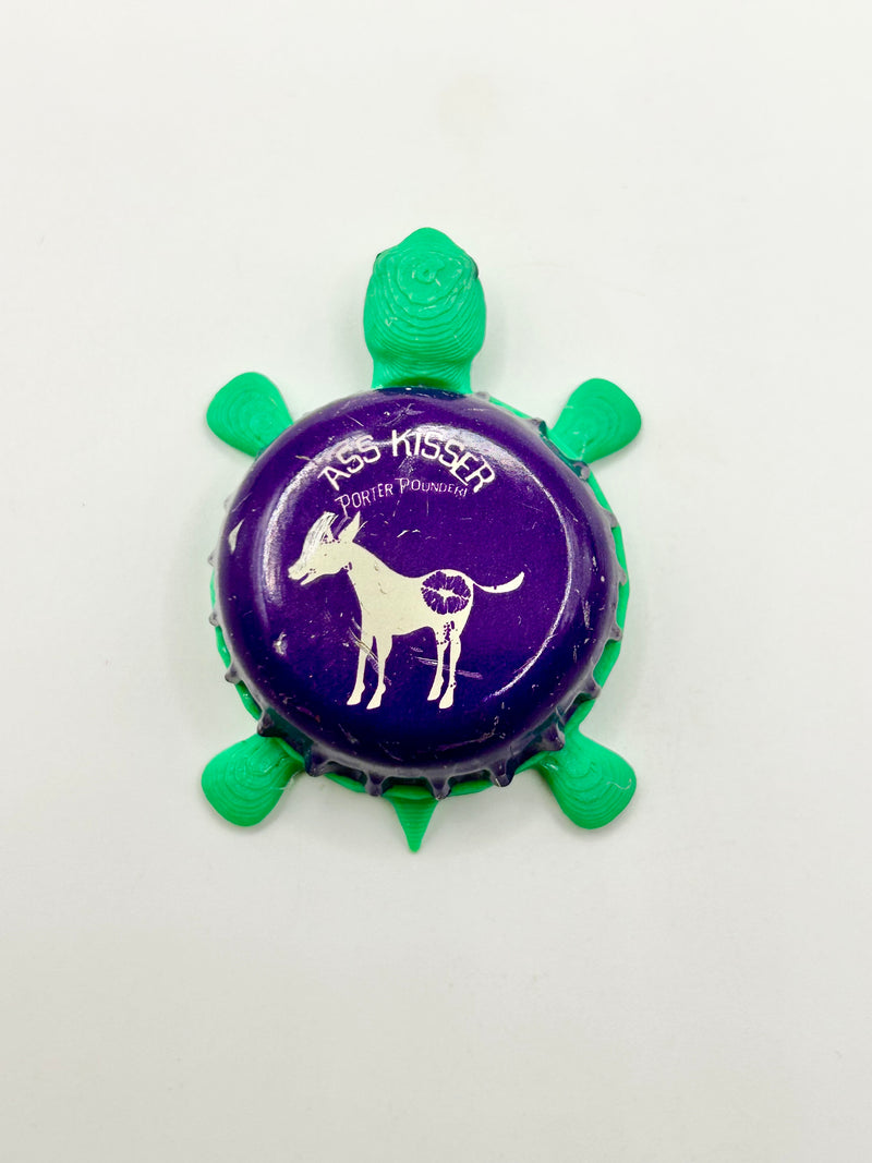 Ass Kisser Porter Pounder - Bottle Cap Magnet Turtle Shell Shocked Art
