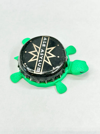 Ale Asylum (Black) - Bottle Cap Magnet Turtle Shell Shocked Art