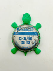 Oscar’s Cream Soda - Bottle Cap Magnet Turtle Shell Shocked Art