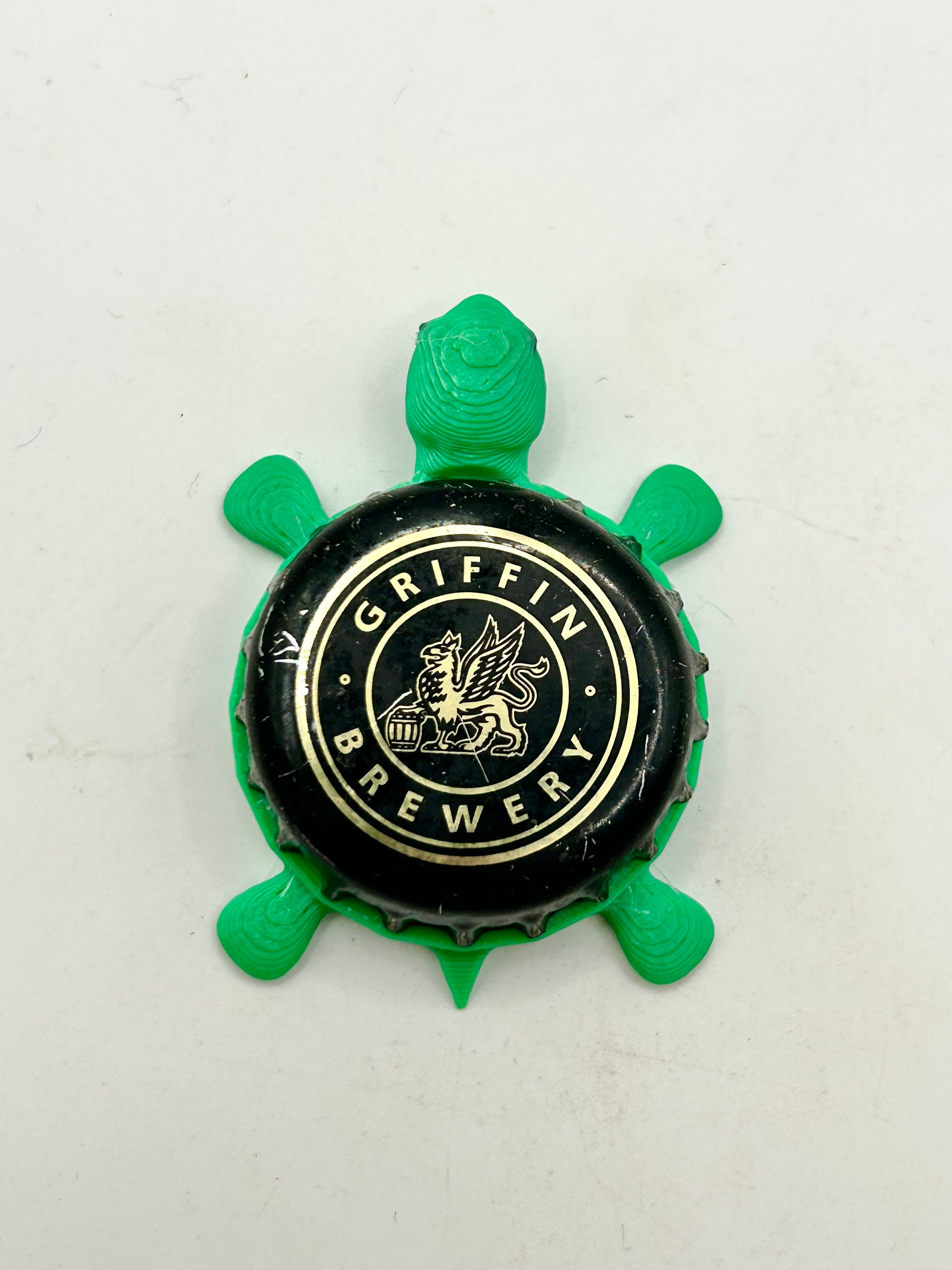 Griffin Brewery - Bottle Cap Magnet Turtle Shell Shocked Art