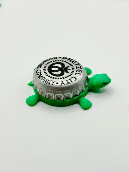 Pretzel City Brewing - Bottle Cap Magnet Turtle Shell Shocked Art
