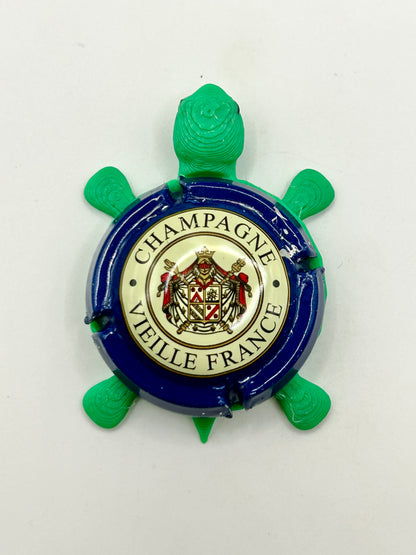 Vieille France Champagne - Bottle Cap Magnet Turtle Shell Shocked Art