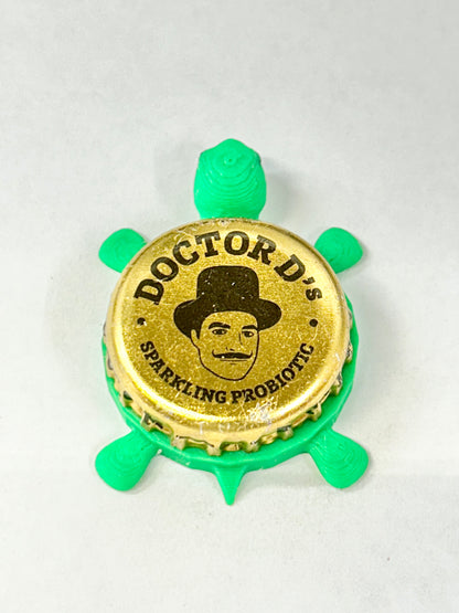 Doctor D’s Sparkling Probiotic - Bottle Cap Magnet Turtle Shell Shocked Art