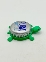 Pura Hard Seltzer - Bottle Cap Magnet Turtle Shell Shocked Art