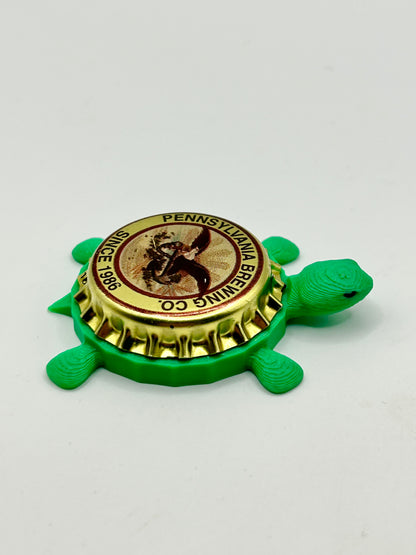 Pennsylvania Brewing - Bottle Cap Magnet Turtle Shell Shocked Art