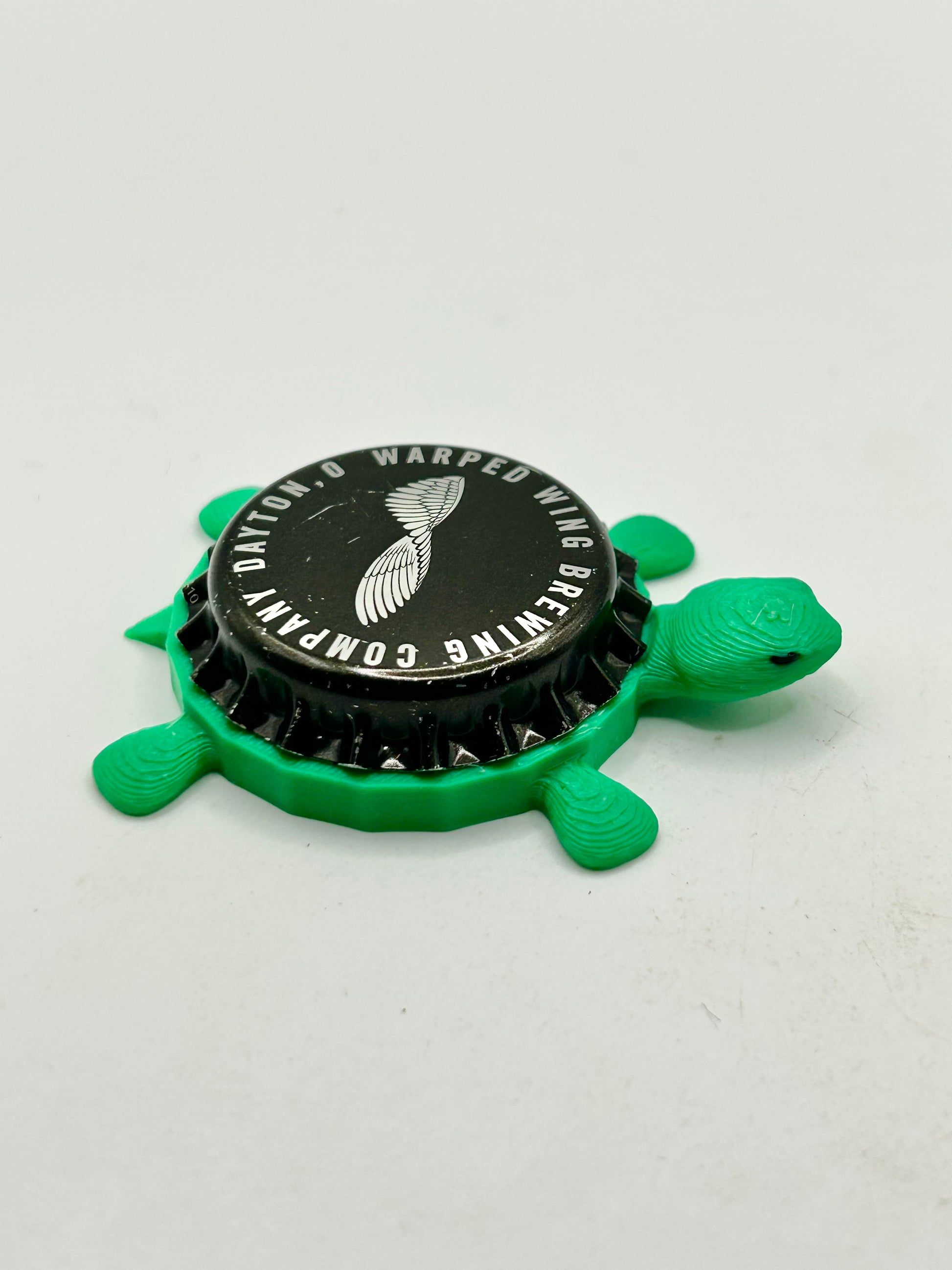 Warped Wing Brewing - Bottle Cap Magnet Turtle Shell Shocked Art
