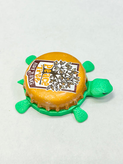 Peace Tree Brewing - Bottle Cap Magnet Turtle Shell Shocked Art