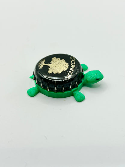O’Connor Brewing - Bottle Cap Magnet Turtle Shell Shocked Art