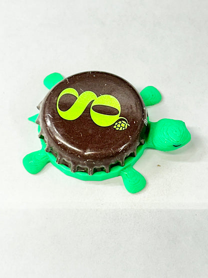 Green’s Premium Pilsner - Bottle Cap Magnet Turtle Shell Shocked Art