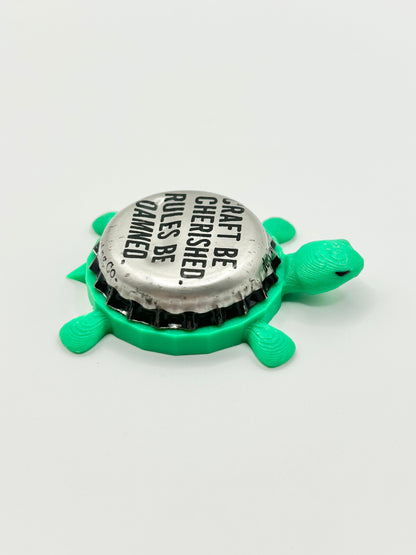 Craft Be Cherished. Rules Be Damned. DuClaw Brewing - Bottle Cap Magnet Turtle Shell Shocked Art