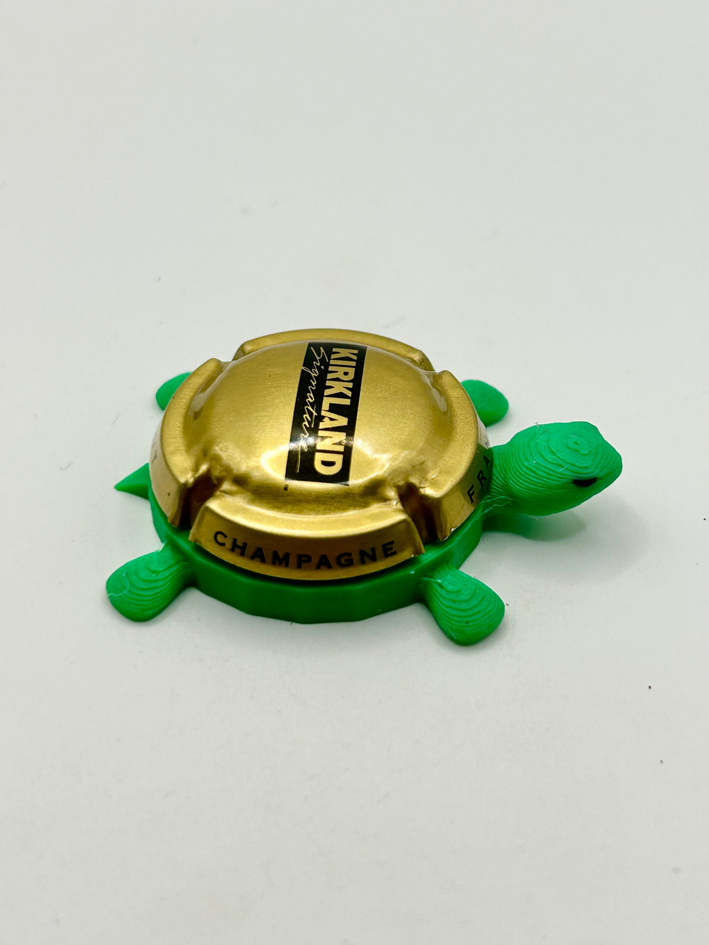 Kirkland Champagne - Bottle Cap Magnet Turtle