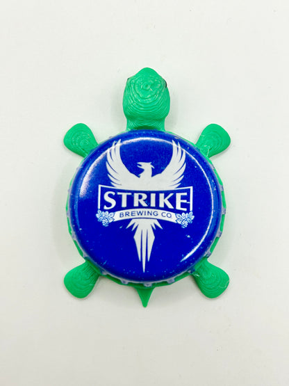 Strike Brewing - Bottle Cap Magnet Turtle Shell Shocked Art
