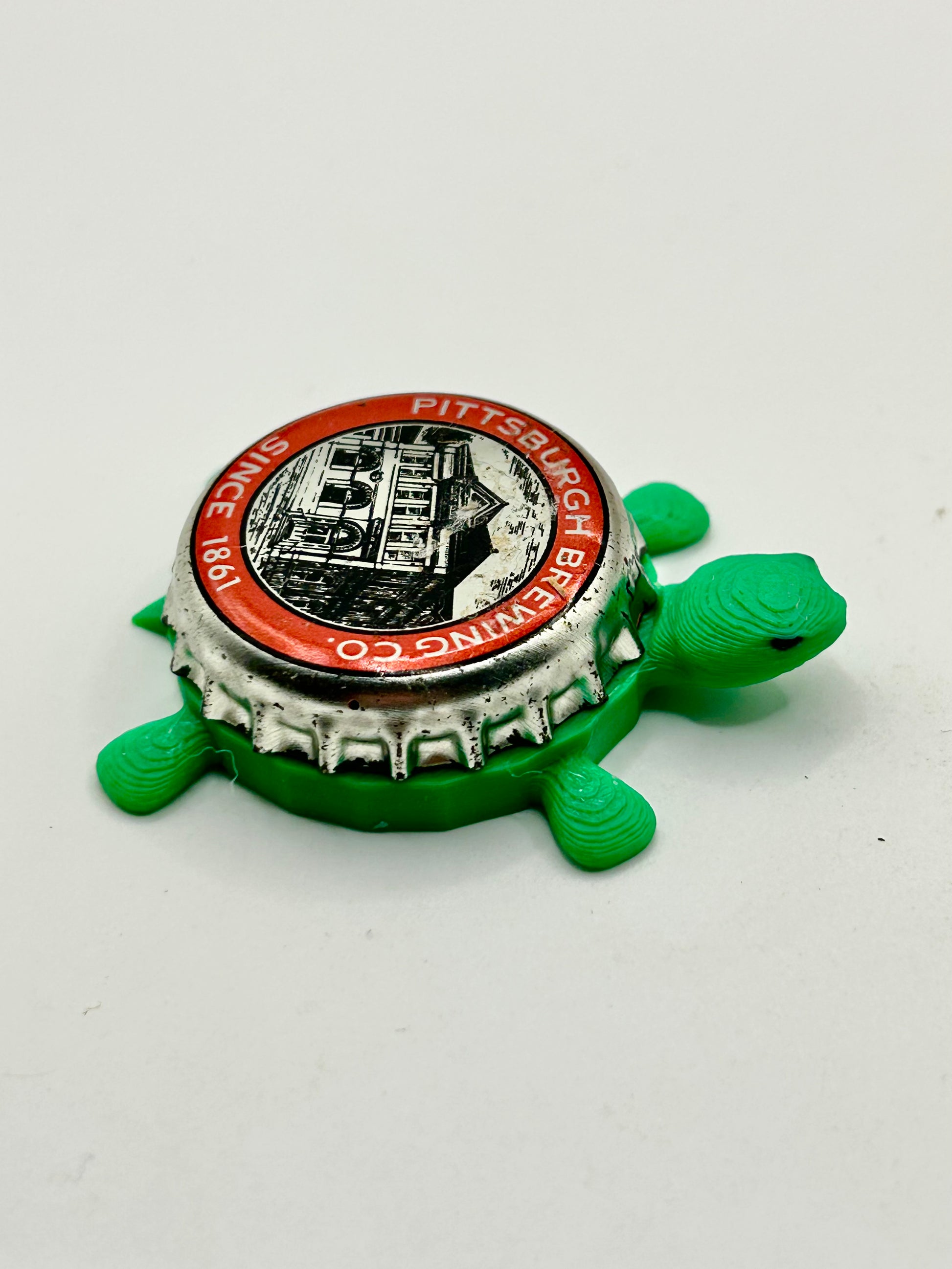 Pittsburgh Brewing - Bottle Cap Magnet Turtle Shell Shocked Art