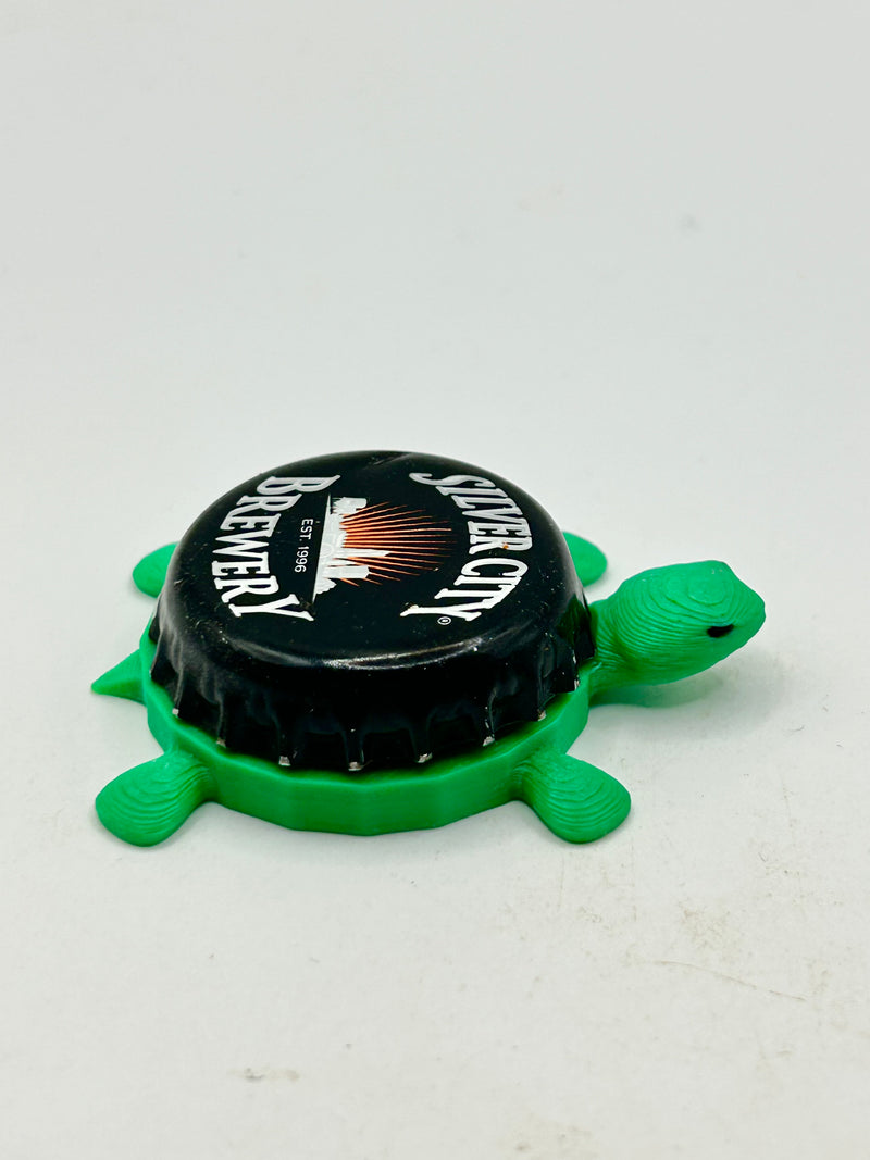 Silver City Brewing - Bottle Cap Magnet Turtle Shell Shocked Art
