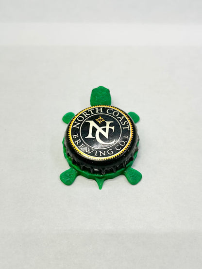 North Coast Brewing Co - Bottle Cap Magnet Turtle Shell Shocked Art