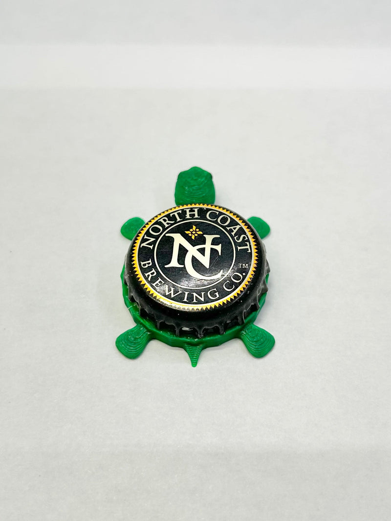 North Coast Brewing Co - Bottle Cap Magnet Turtle Shell Shocked Art